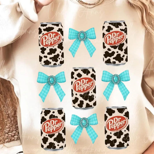 COW PRINT DR PEPPER WITH TURQUOISE BOWS CROQUETTE